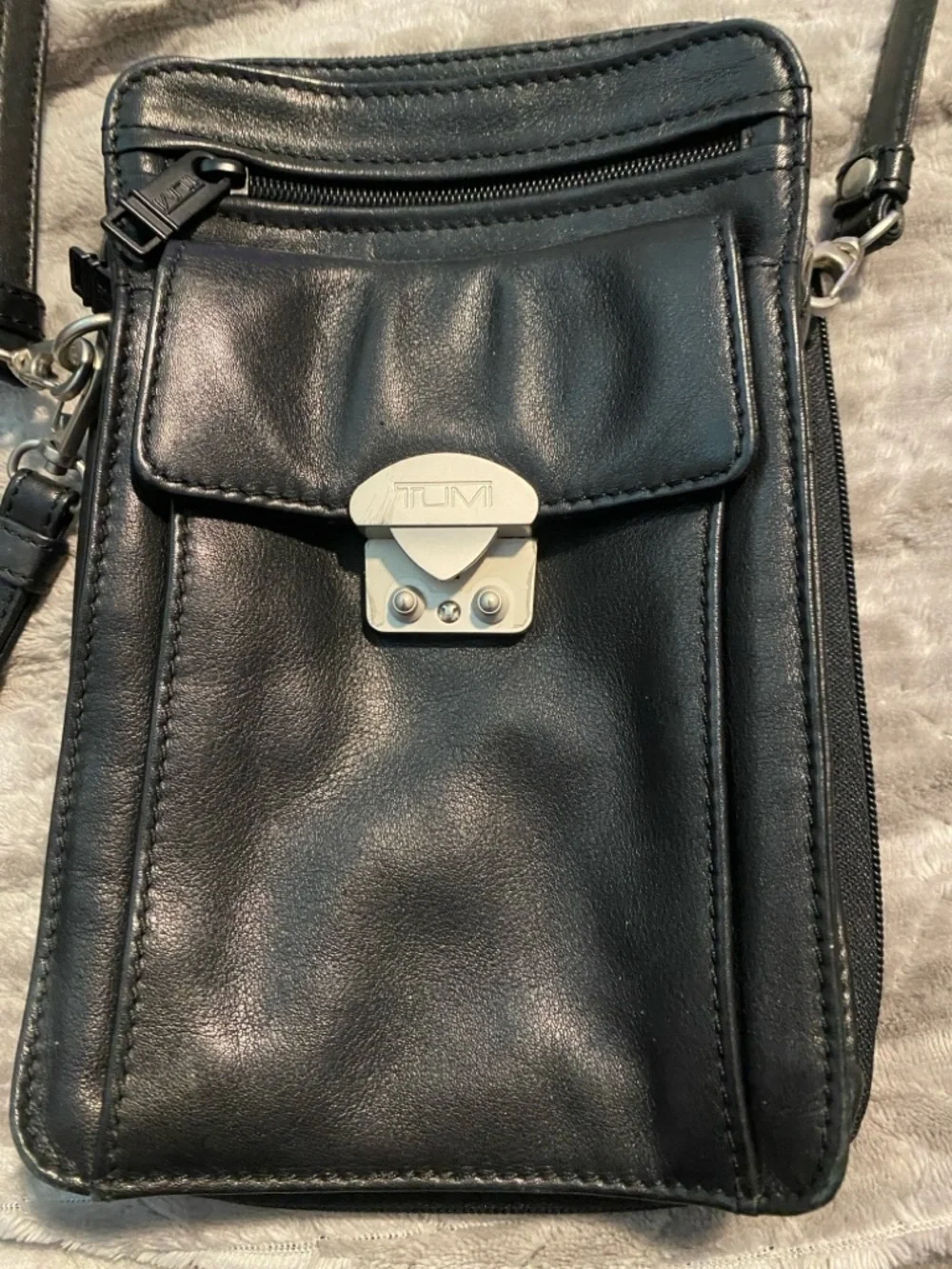 TUMI Black Leather Messenger Bag with Silver Hardware
